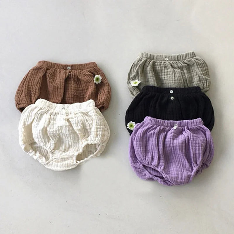 CottonLantern Toddler Bloomers | 

Made from soft cotton, these adorable pants are perfect for summer. The lantern-style design adds charm, suitable for boys and girls alike.