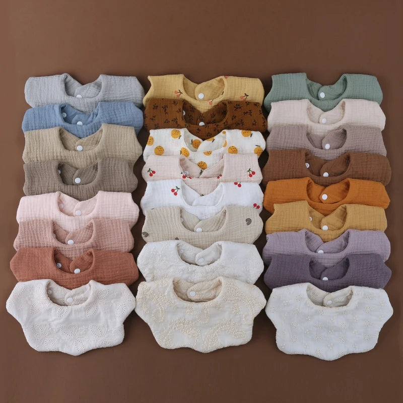 CozyCare Baby Bib | 

Soft, absorbent cotton bibs with adjustable snaps and a charming bandana design keep your baby clean and stylish during feeding time.