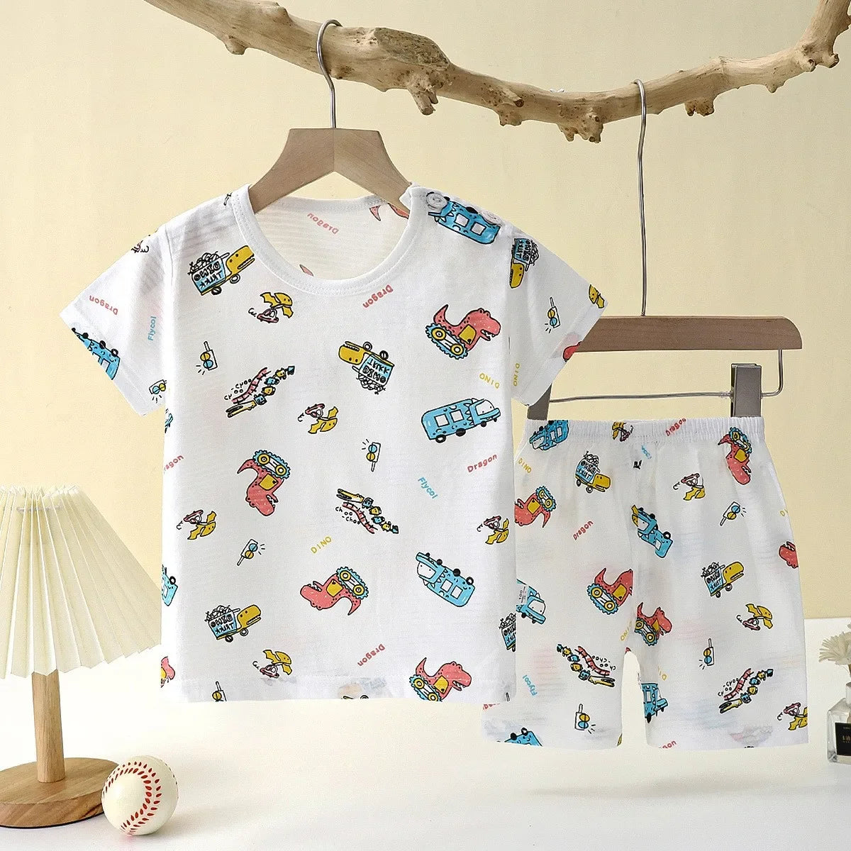 BreezyDreams Kids' Summer Sleep Set | 

Made from soft cotton, it includes a playful tee and matching shorts for cool comfort. Perfect for bedtime or lounging, it's the ultimate sleepwear for boys and girls.