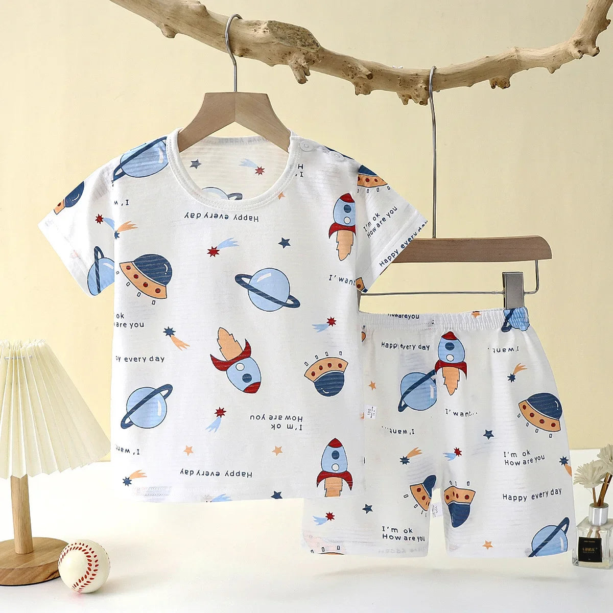 BreezyDreams Kids' Summer Sleep Set | 

Made from soft cotton, it includes a playful tee and matching shorts for cool comfort. Perfect for bedtime or lounging, it's the ultimate sleepwear for boys and girls.