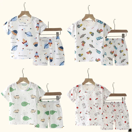 BreezyDreams Kids' Summer Sleep Set | 

Made from soft cotton, it includes a playful tee and matching shorts for cool comfort. Perfect for bedtime or lounging, it's the ultimate sleepwear for boys and girls.